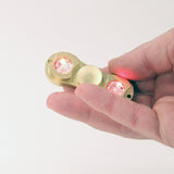 The Zeekio Thumb Spinner - Fidget Spinner with LED Lights